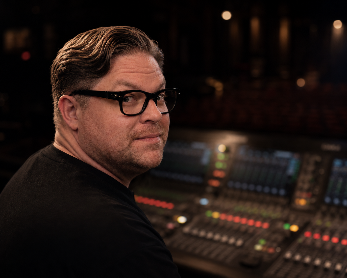 Mercer Aplin at the front-of-house mix position